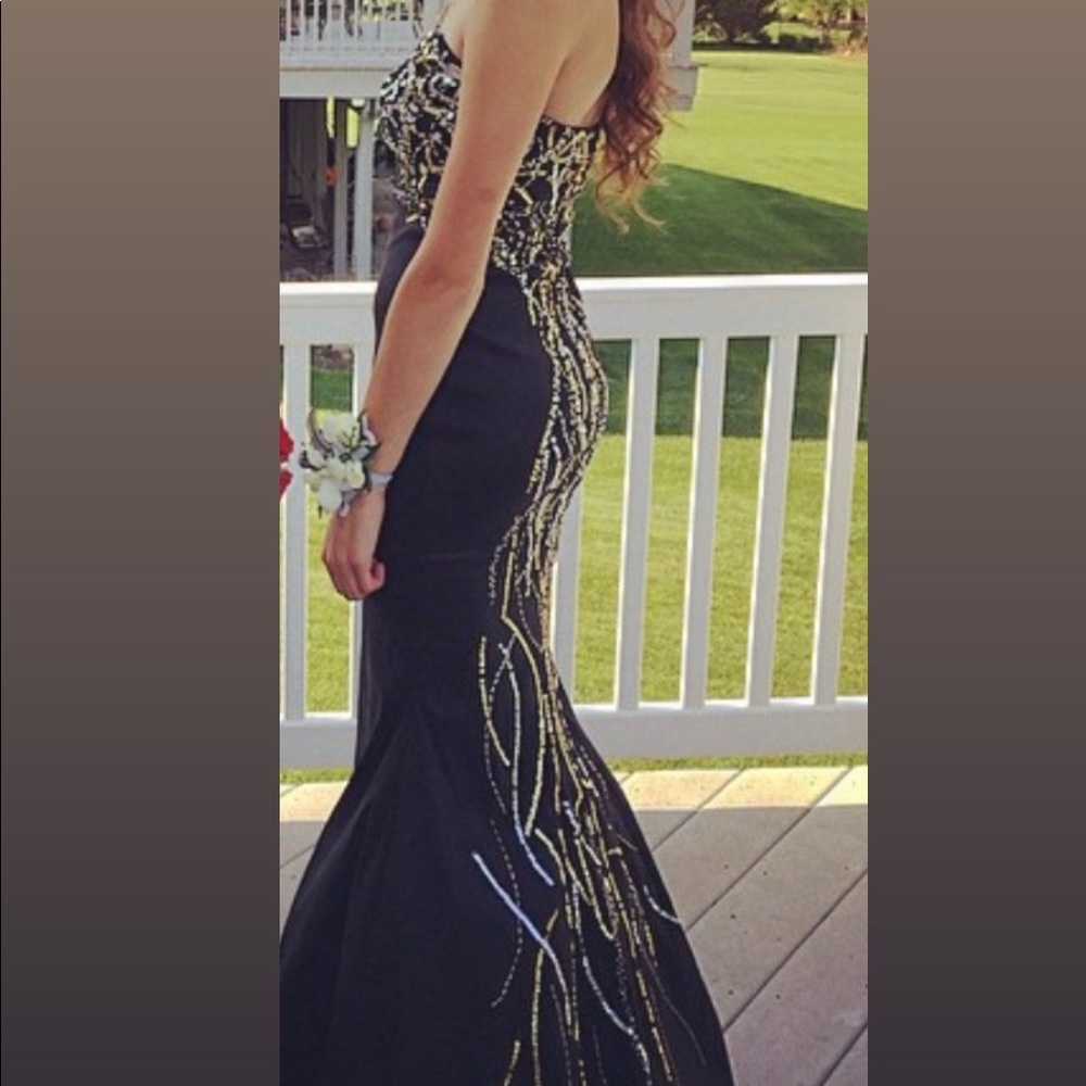 Stunning sequin strapless Mermaid fit prom dress